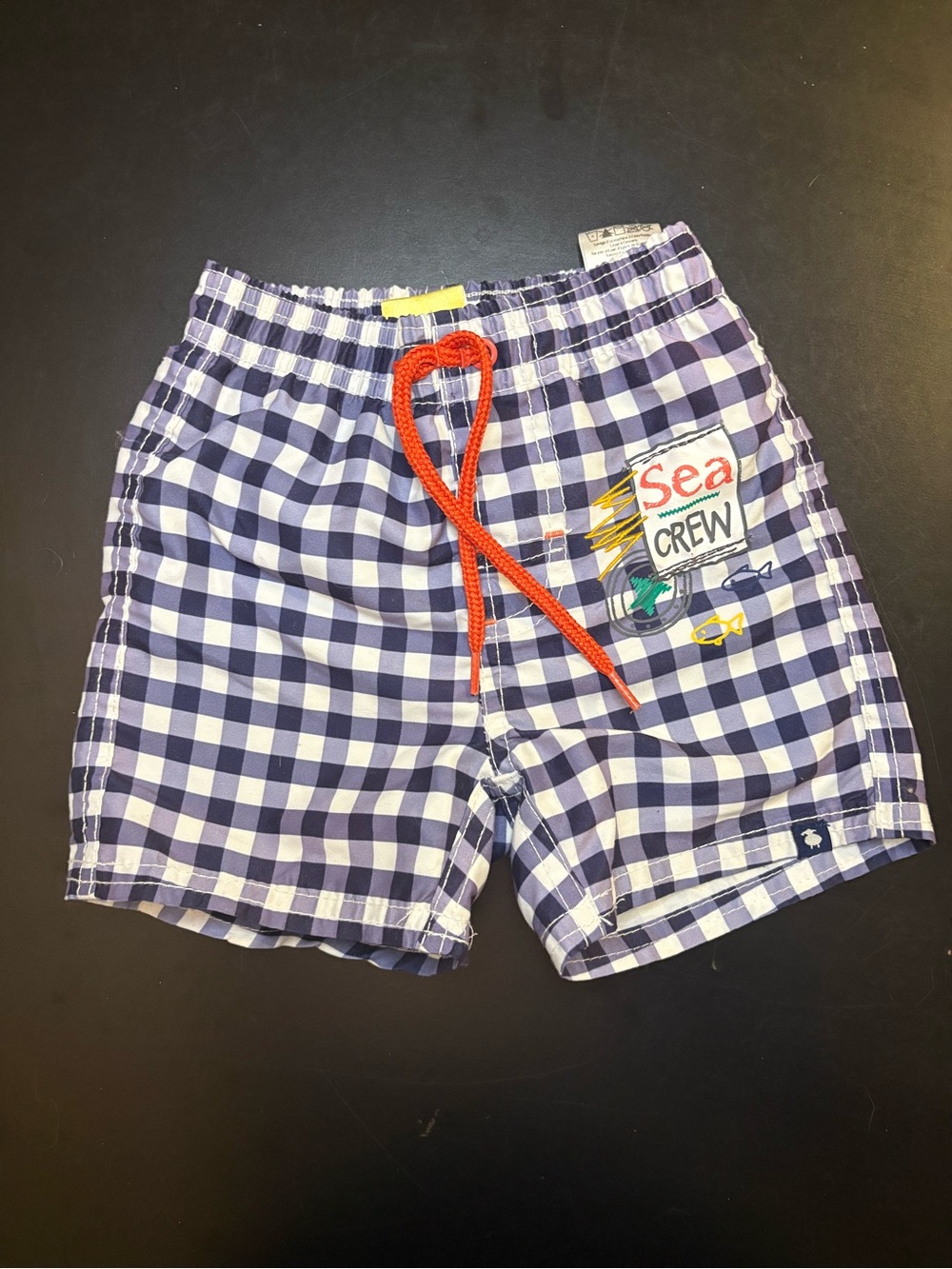 Boys checkered  Navy and white  trois moutons Swim Shorts with Red Drawstring